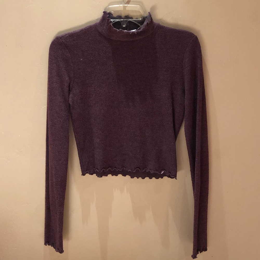 Out from under cropped turtle neck